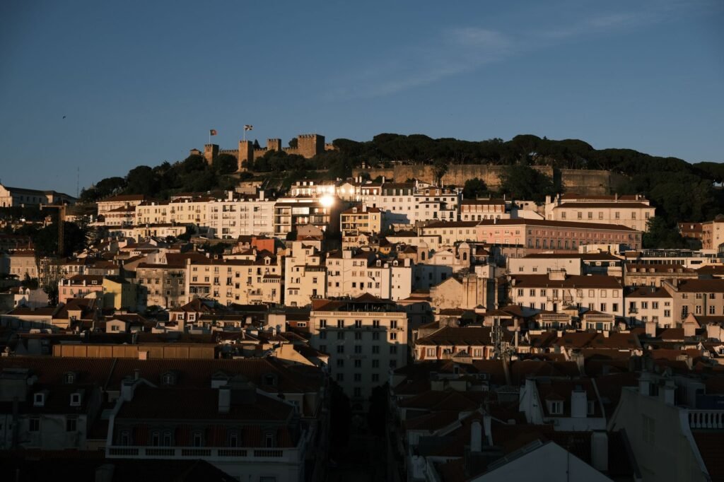 Castle sunsets, street magic and a centenary: August in Lisbon